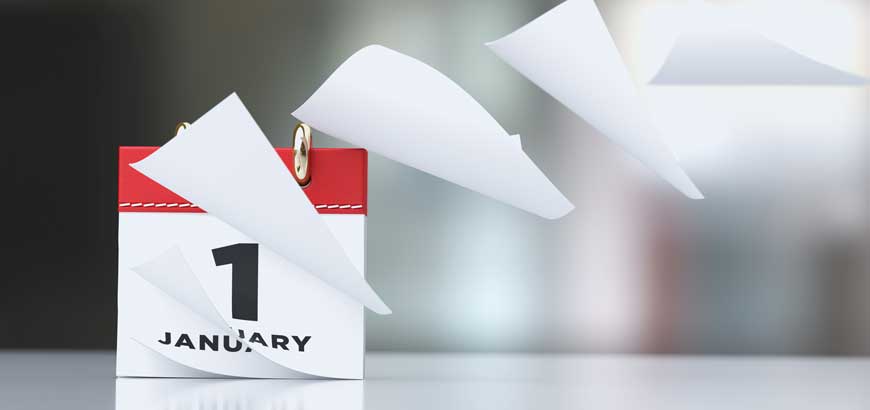   <p><span>A tear away desk calendar says &quot;January 1st&quot; and the pages are flying away</span></p>  <div><span><br>  </span></div>  