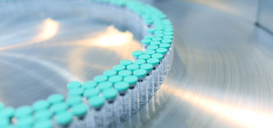 Lab vials on a conveyor belt