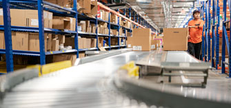 A roller conveyor belt in a distribution warehouse