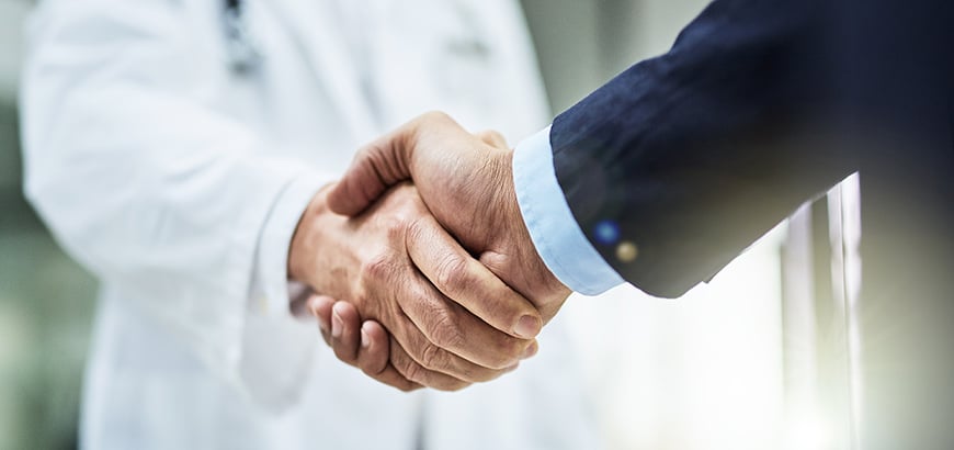 Two people shaking hands