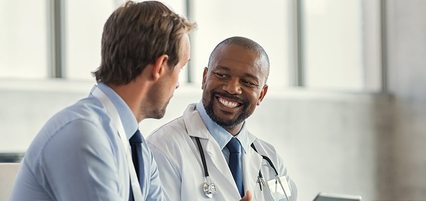 A doctor talking to a patient