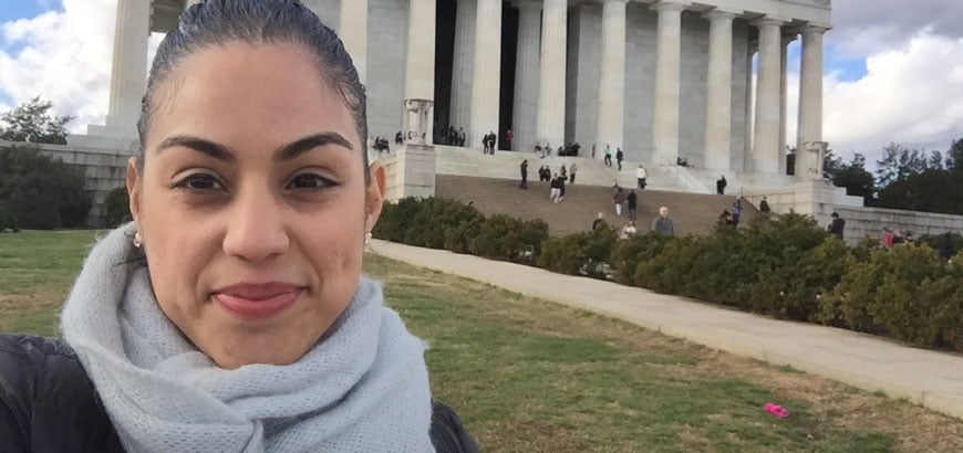 <span>Cathy Reinoso</span> stands in front of a monument in Washington DC