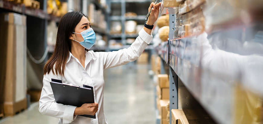 A female pharmacist in a warehouse