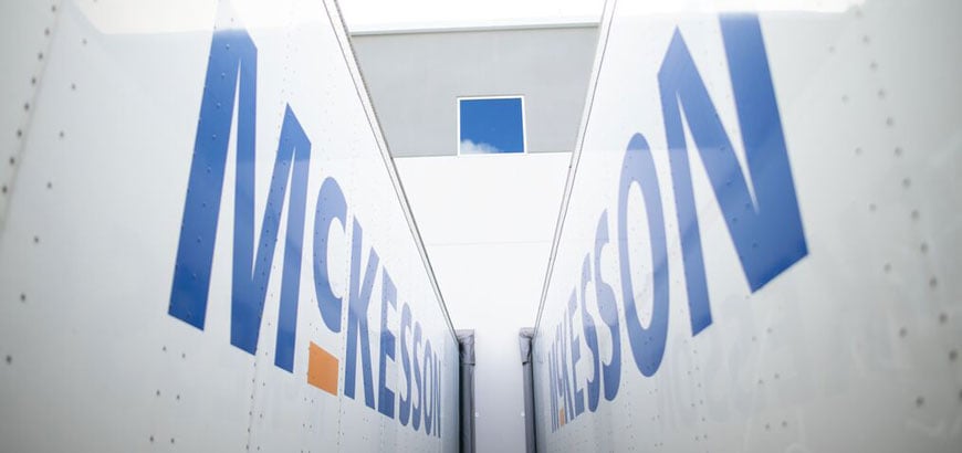 Close up view of the McKesson logo on the side of delivery trucks