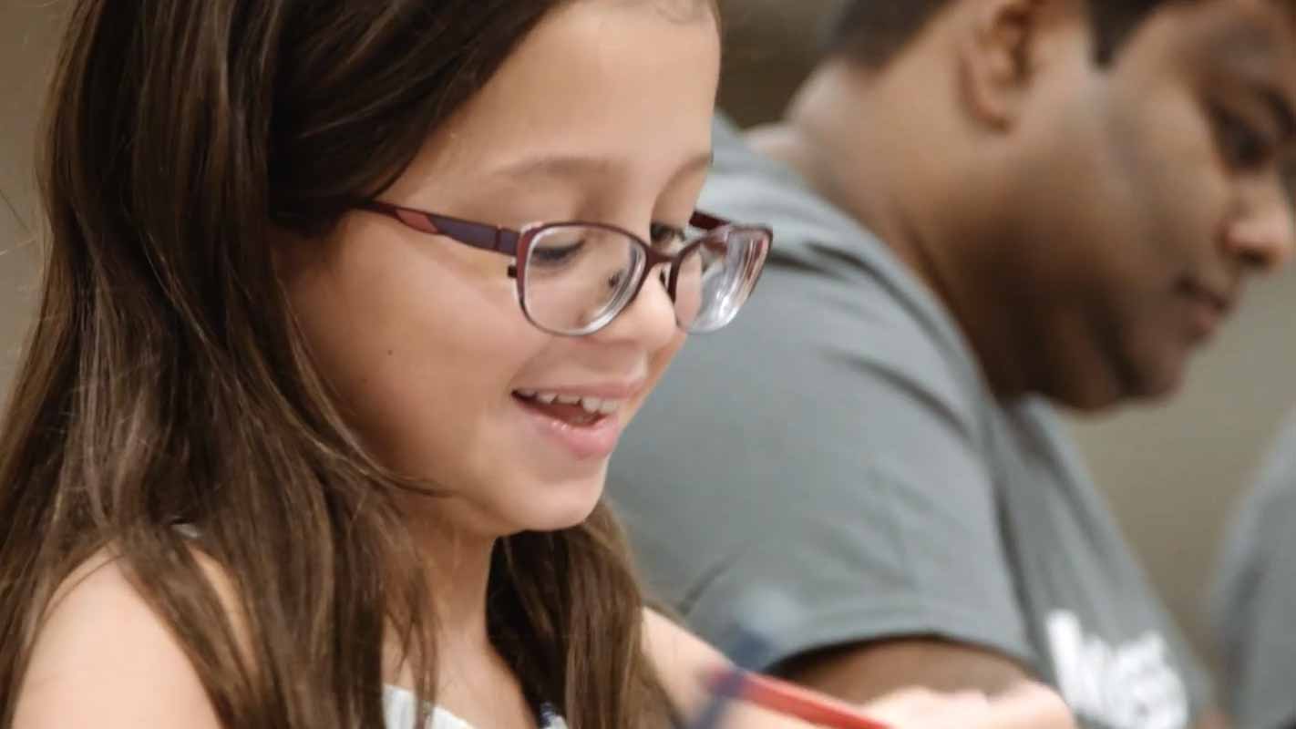 Young child wearing glasses