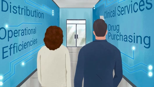 Two people walk down a hallway with healthcare phrases written on the walls