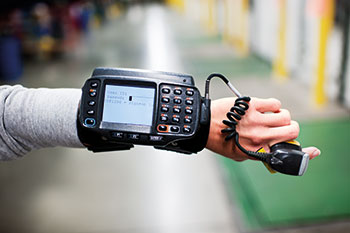 Closeup of an Acumax wrist mounted item scanner