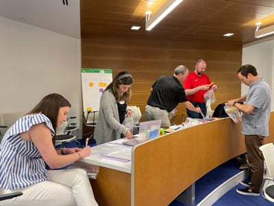 McKesson Medical-Surgical employees assembling care kits for the Ronald McDonald House. 