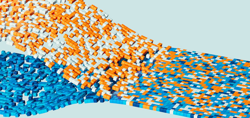 A wave of small blue, orange, and white cubes cascades over a smooth light blue background.