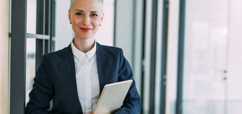 A woman holding a tablet